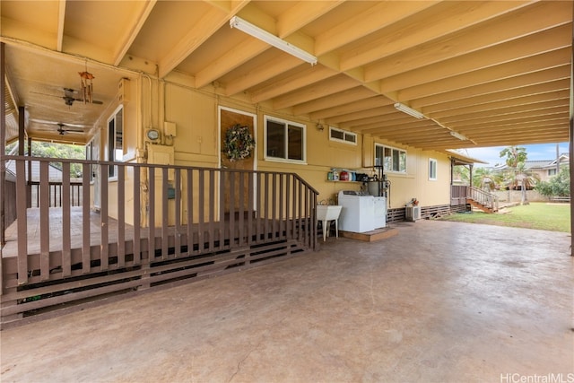 view of property exterior featuring washer / dryer