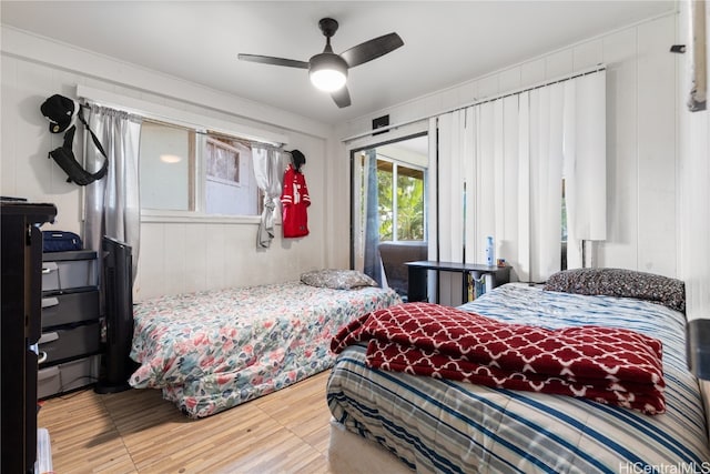 bedroom featuring hardwood / wood-style floors and ceiling fan