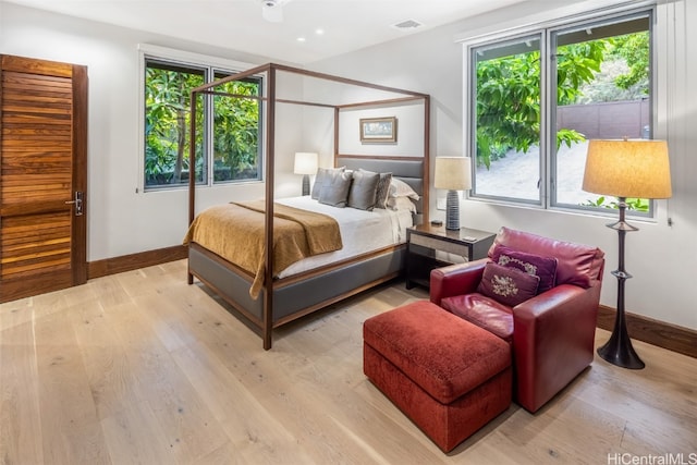 bedroom with light wood-type flooring