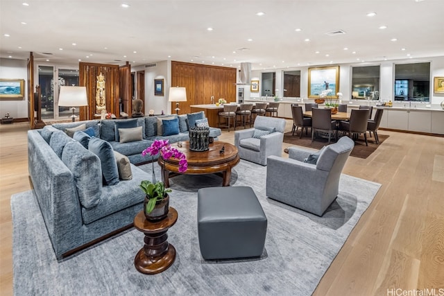 living room with light hardwood / wood-style flooring