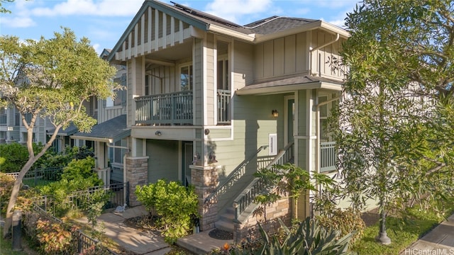 view of front of house with a balcony