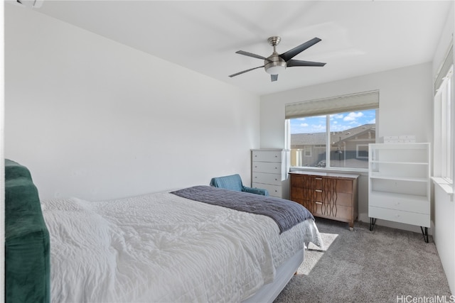 bedroom with ceiling fan and carpet floors