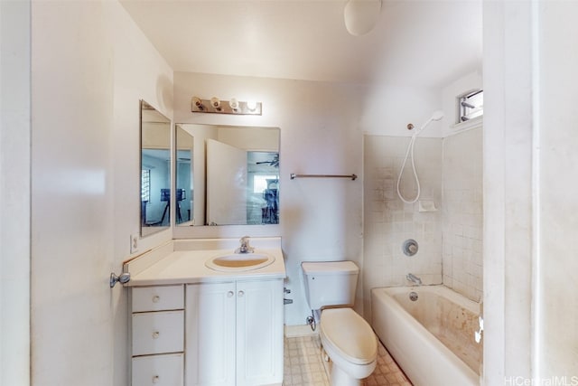 full bathroom with vanity, toilet, and tiled shower / bath