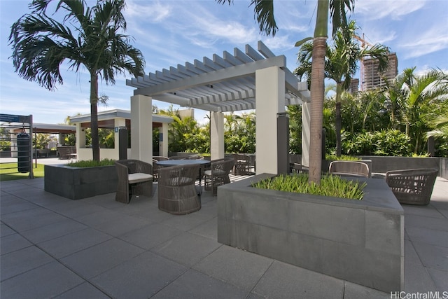 view of patio featuring a pergola