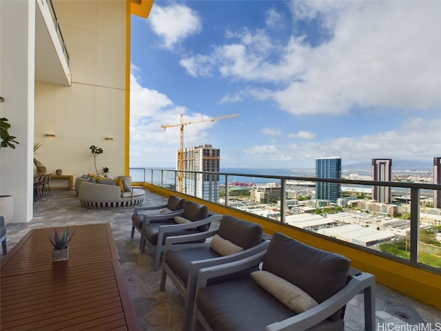 balcony featuring a water view