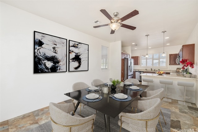 dining area featuring ceiling fan