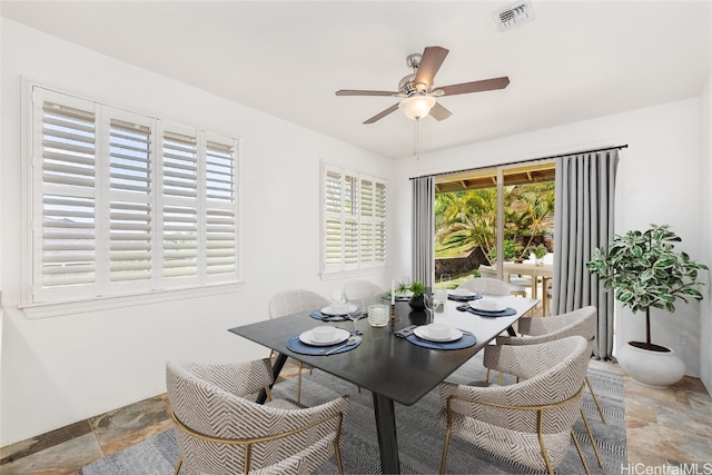 dining room with ceiling fan