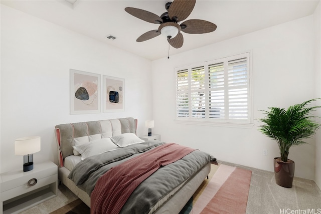 carpeted bedroom featuring ceiling fan