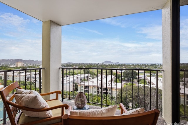 balcony featuring a mountain view