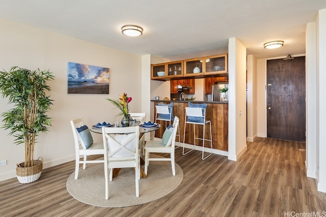 dining room with dark wood-type flooring