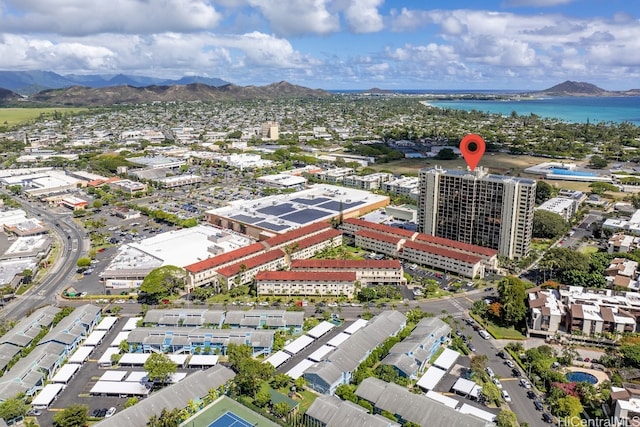 birds eye view of property featuring a water and mountain view