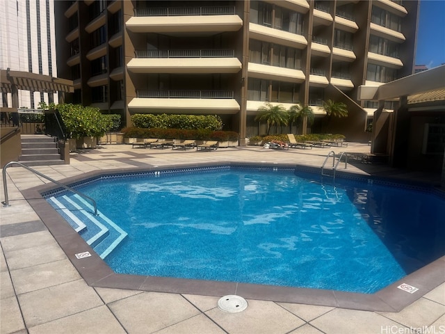 view of pool with a patio area