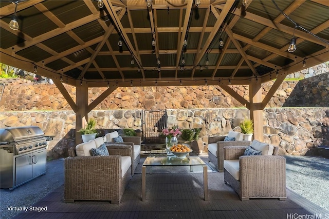 view of patio / terrace with a gazebo and an outdoor hangout area