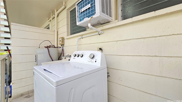 1655 Liholiho St, Honolulu, HI 96822 - laundry area featuring washer / dryer and water heater