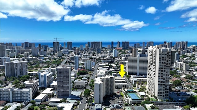 property's view of city featuring a water view