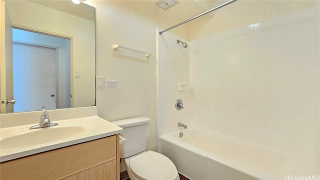 full bathroom with vanity, toilet, and tiled shower / bath