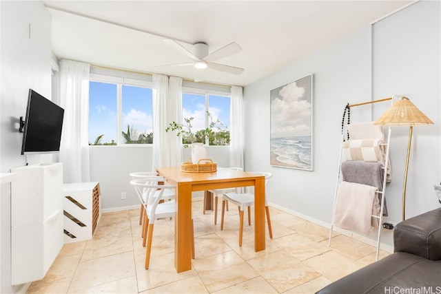 dining space featuring ceiling fan