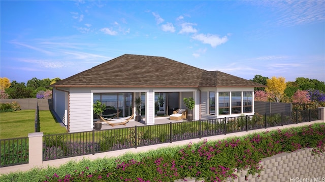 rear view of property with a yard, a patio, roof with shingles, and a fenced backyard