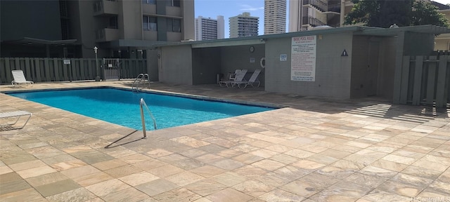 view of pool featuring a patio area