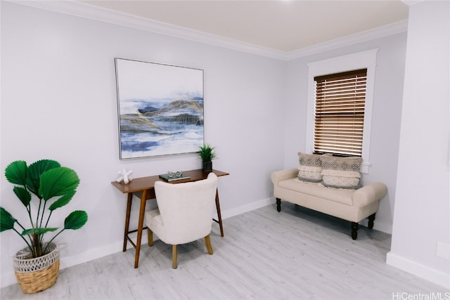 office featuring ornamental molding and light hardwood / wood-style floors