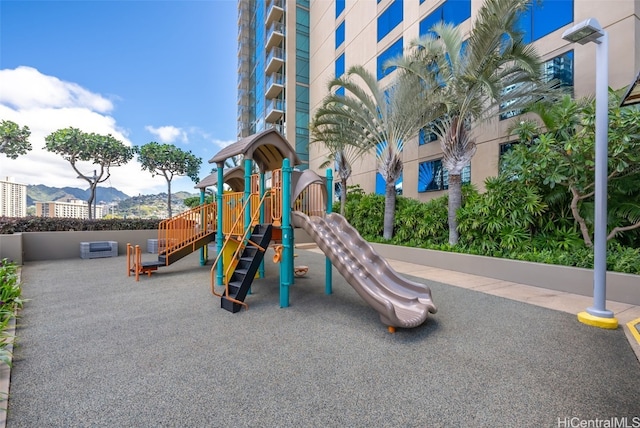 view of play area with a mountain view