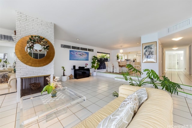 tiled living room with a fireplace