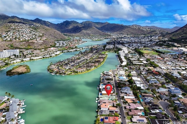 bird's eye view with a water and mountain view