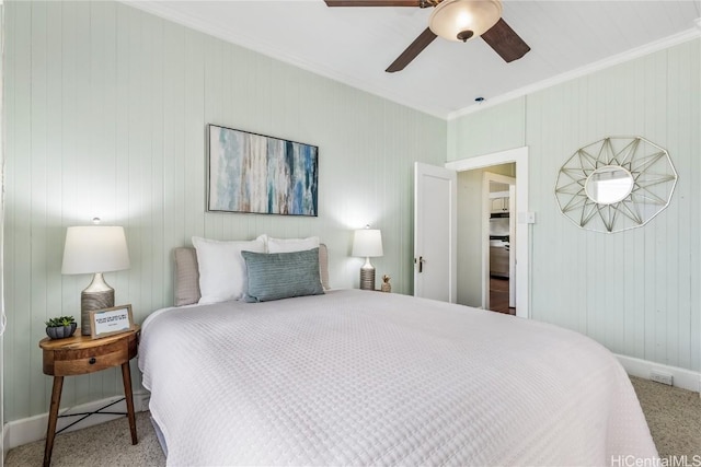 bedroom with carpet flooring, ceiling fan, and ornamental molding