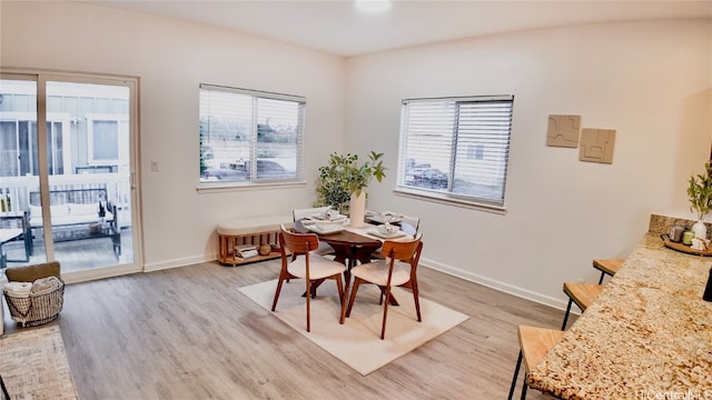 dining room featuring light hardwood / wood-style floors