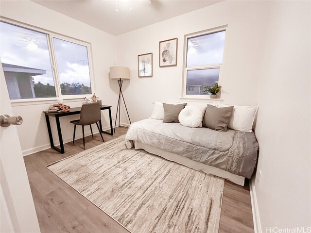 bedroom with light wood-type flooring