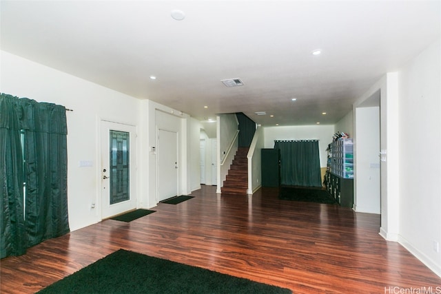 foyer entrance featuring dark hardwood / wood-style flooring