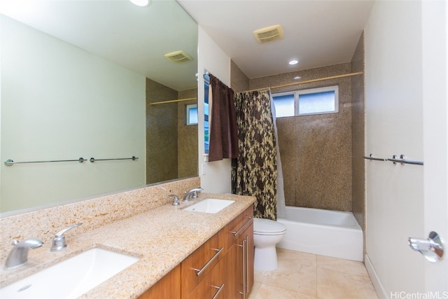 full bathroom with shower / tub combo, vanity, toilet, and tile patterned floors