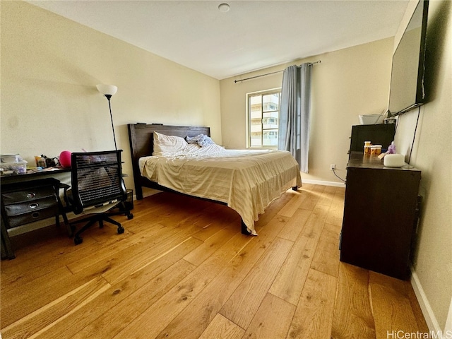 bedroom featuring light wood-type flooring