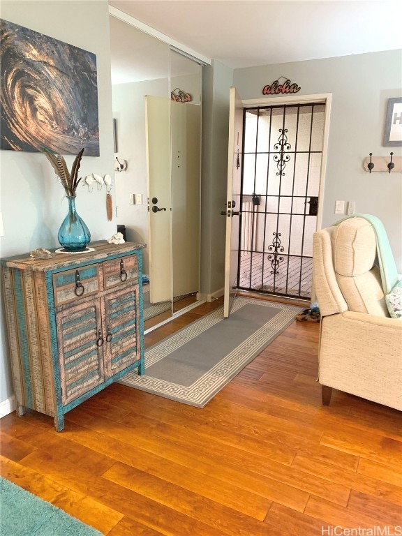 doorway with wood finished floors