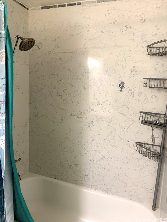 bathroom with shower / bath combo