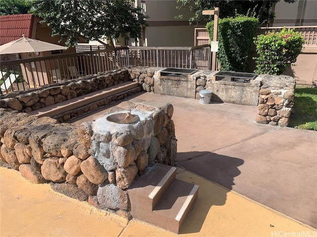 view of patio with fence