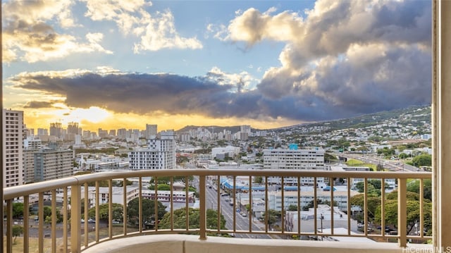 view of balcony at dusk