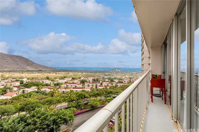 balcony featuring a mountain view