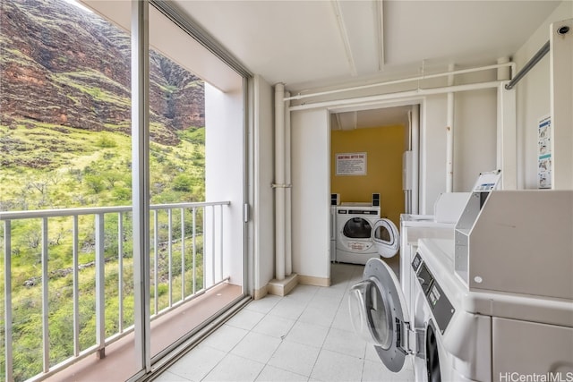 clothes washing area with washer and dryer