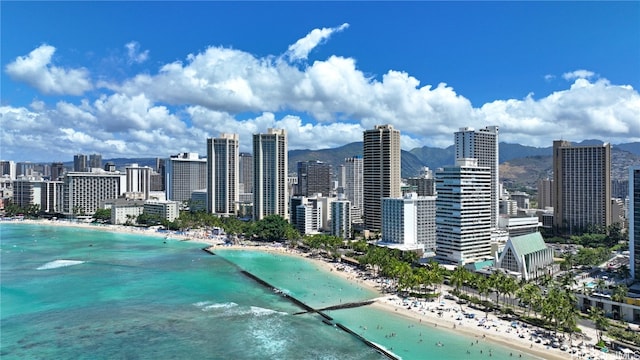 view of city featuring a view of the beach and a water view