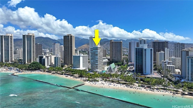 city view featuring a beach view and a water view