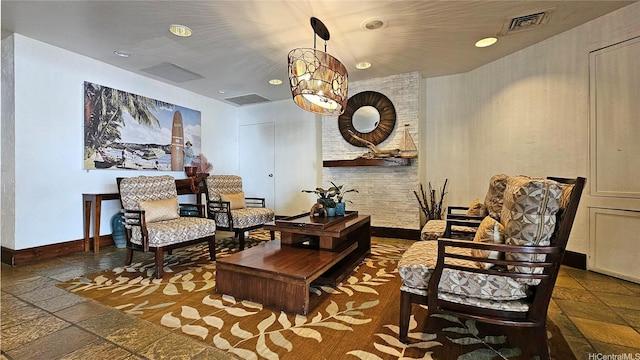 2500 Kalakaua Ave Unit 1606, Honolulu, HI 96815 - sitting room featuring stone tile floors, baseboards, and recessed lighting