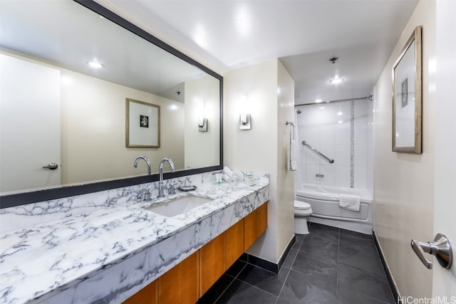 full bathroom with toilet, tiled shower / bath combo, vanity, and tile patterned floors