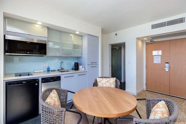 410 Atkinson Dr Unit 3007, Honolulu, HI 96814 - kitchen featuring dishwasher, light countertops, a sink, refrigerator, and glass insert cabinets