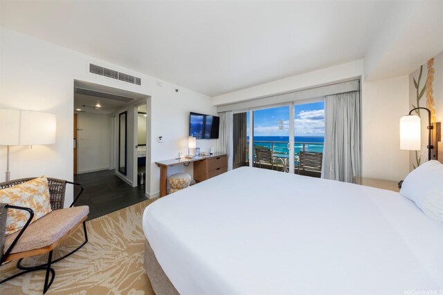 410 Atkinson Dr Unit 3007, Honolulu, HI 96814 - bedroom with access to exterior and wood finished floors