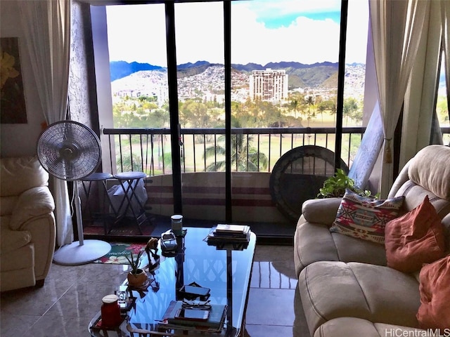 sunroom with a mountain view