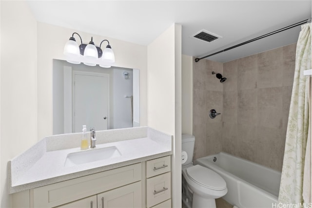 full bathroom featuring shower / bath combo with shower curtain, toilet, and vanity