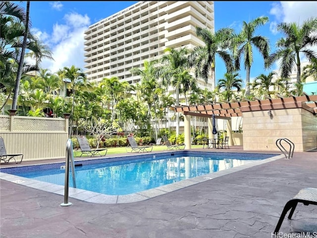 view of pool featuring a pergola and a patio area