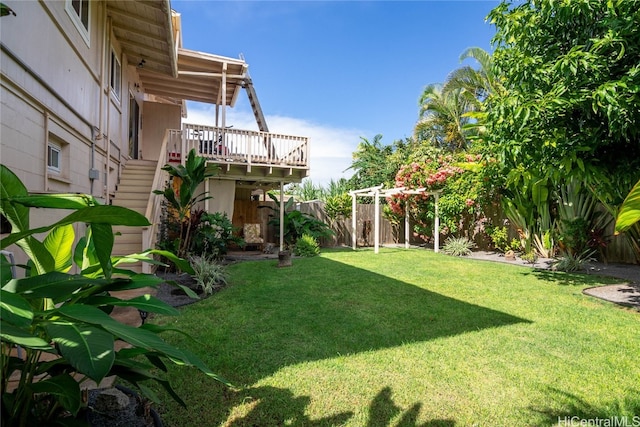 view of yard with a wooden deck