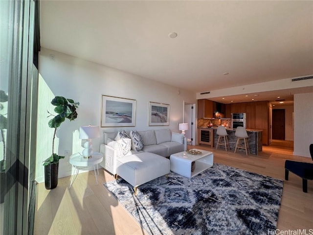 living room featuring light hardwood / wood-style floors